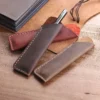 1704891057167-f2ebf99963fa479f98e9ebf7af6b3a5d-goods.webp 1pc Hand-stitched Cowhide Pen Bag