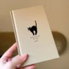 d358af6eea2543b4a1684972bd00e200-goods.webp 1pc 2025 Cycle Plan B6  Cute Black Cat Design Linen Notebook